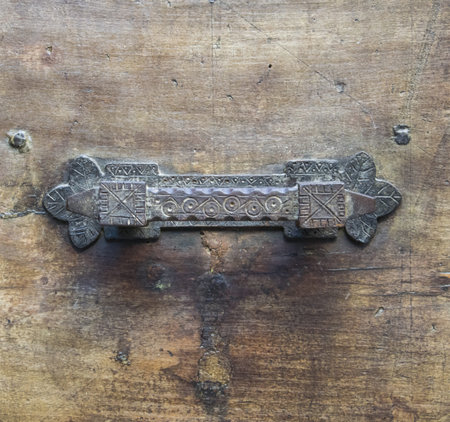 Details of an ancient Italian door in Florence, Italy.の写真素材