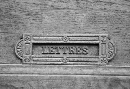 Details of an ancient Italian door in Florence, Italy (black and white).の写真素材