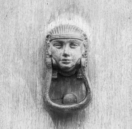 Details of an ancient Italian door, black and white.の写真素材