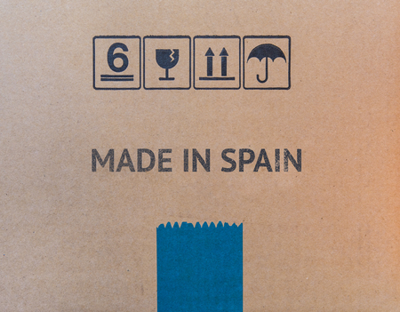 MADE IN SPAIN written on brown cardboard box.の写真素材