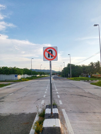 Traffic sign on the road in the evening, no overtakingの写真素材