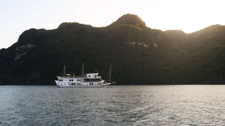Tourist Junks in Halong Bay,Panoramic view of sunset in Halong Bay, Vietnam, Southeast Asiaの写真素材