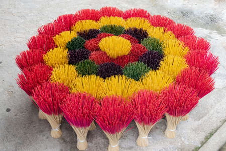 Colorful incenses snapshot. Colourful incense sticks displayed in a shop at Hue, Vietnamの写真素材