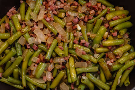 Close up. Green beans and serrano ham. Spanish cuisine. Food an texture concept.の写真素材