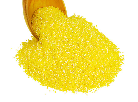 corn grits in the wooden spoonの写真素材