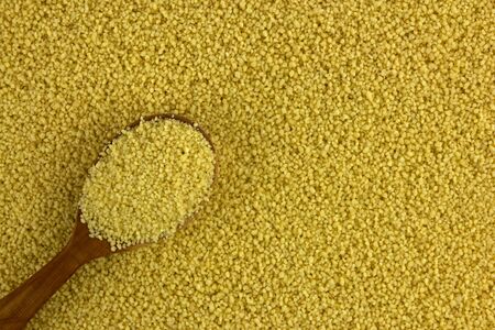 Raw organic couscous backgroundの写真素材