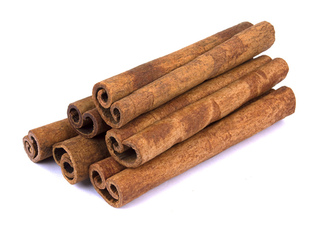 Fragrant cinnamon sticks isolated on white backgroundの写真素材