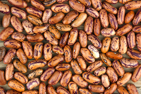 Colored haricot beans closeup on a background, top view, beans background.