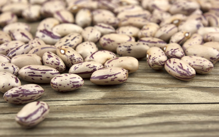 Haricot beans on wooden table, healthy food and nutritionの写真素材
