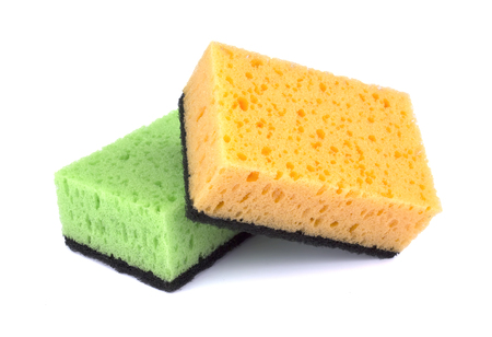 Sponges for dishwashing isolated on a white backgroundの写真素材