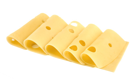 slices of cheese isolated on white background with clipping pathの写真素材