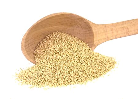 Raw Organic Amaranth seeds in wooden spoon isolated on white backgroundの写真素材