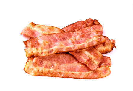 Cooked bacon rashers isolated on white background, deliciously.の写真素材