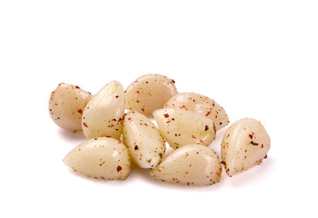 Canned garlic, isolated on white. Tasty pickled garlic.の写真素材