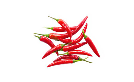 Red fresh chili peppers isolated on white background