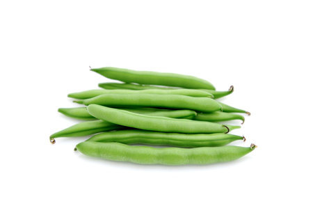pile of green beans isolated on a white background