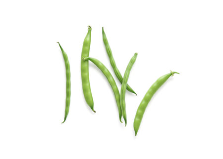 pile of green beans isolated on a white background