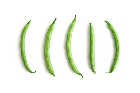 pile of green beans isolated on a white background