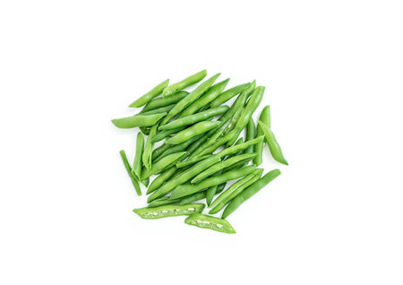 pile of green beans isolated on a white backgroundの写真素材
