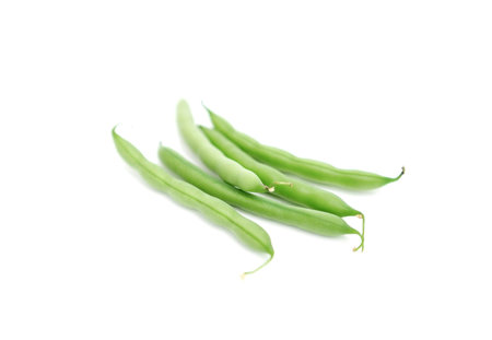 pile of green beans isolated on a white backgroundの写真素材
