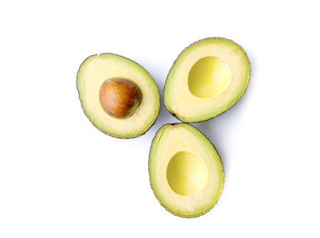 Fresh green avocado isolated on white background
