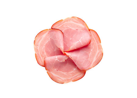 Sliced hot smoked ham, isolated on white backgroundの写真素材