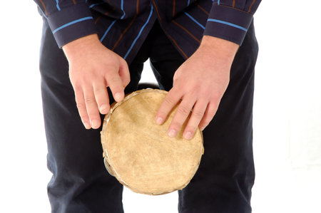 Closeup of a man playing jambe