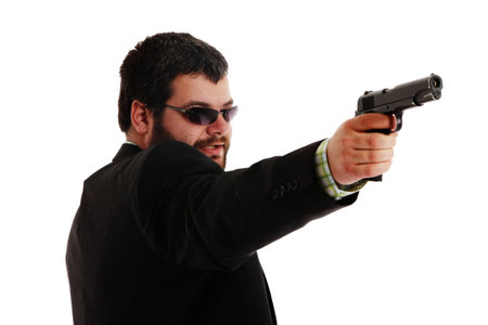 man holding gun wearing sunglassesの写真素材