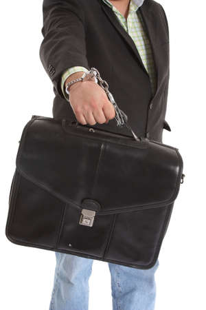Security transporter handcuffed to a leather caseの写真素材