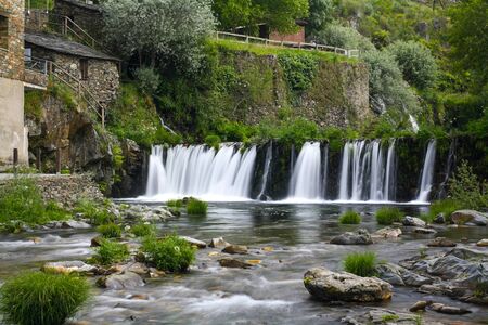 Waterfalls somewhere in the mountainの写真素材