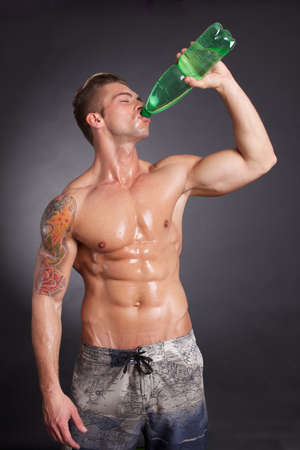 body builder drinking waterの写真素材