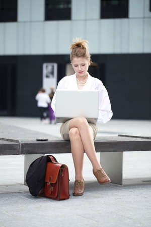 young businesswoman with laptopの写真素材