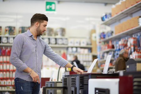 working in hardware storeの写真素材