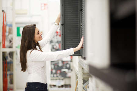 woman in hardware storeの写真素材