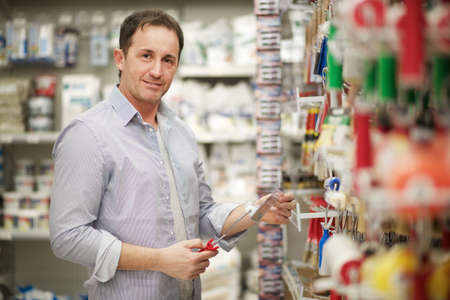 adult man in hardware storeの写真素材