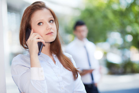 businesswoman talking to mobile