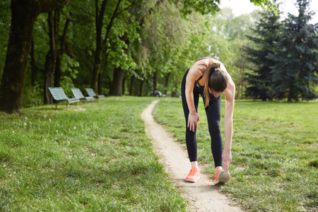 woman doing stretching in the parc