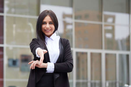 Close up portrait of a professional business woman smiling outdoorの写真素材