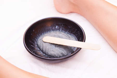 Body Scrub. Beautiful Blonde Gets a Salt Scrub Beauty Treatment in the spa Salonの写真素材