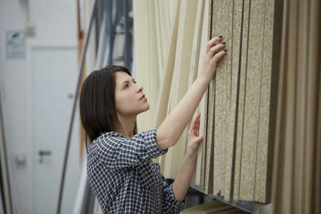 woman working at hardware storeの写真素材