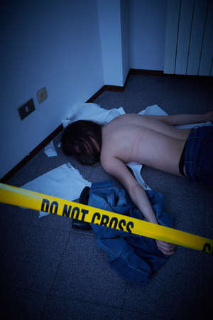 murdered woman lying on a floor - crime sceneの写真素材
