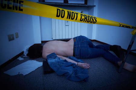 murdered woman lying on a floor - crime sceneの写真素材