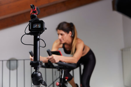 Vlogger recording spinning lesson