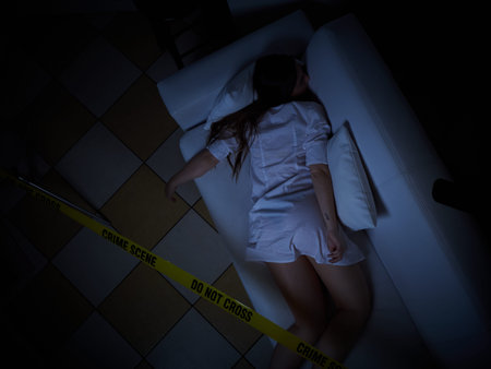 young woman lying dead on the floor after rape - crime scene