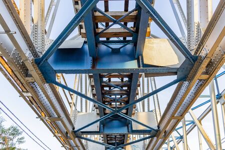 railroad crossing bridge infrastructure is taken from belowの写真素材