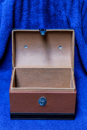 open treasure chest box on blue cloth backgroundの写真素材
