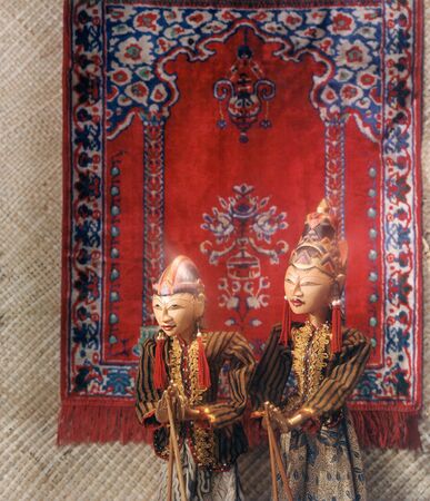 Traditional Indonesian Wayang on sajadah backgroundの写真素材
