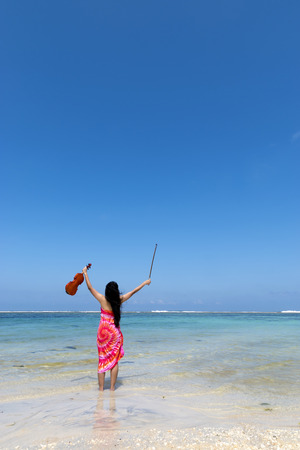 Girl with violinの写真素材