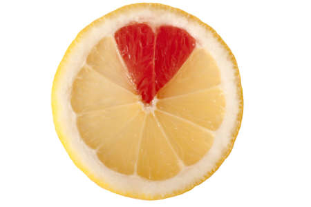 Lemon and grapefruit combination form a heart silhouetteの写真素材