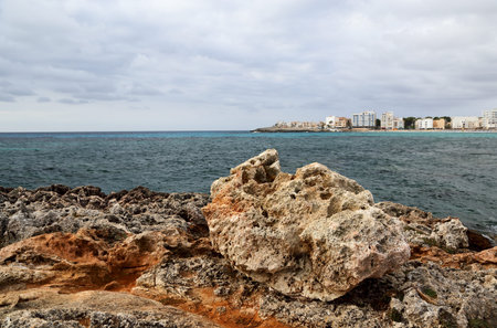 Rocky shore of the sea in cloudy weather. Mallorca. Spain